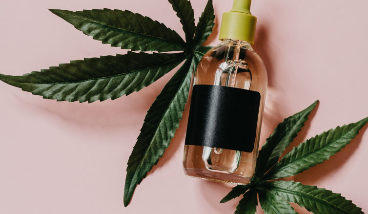 Oil in Dropper Bottle with Leaves